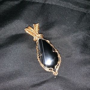 Golden wire wrapped crystal agate pendant